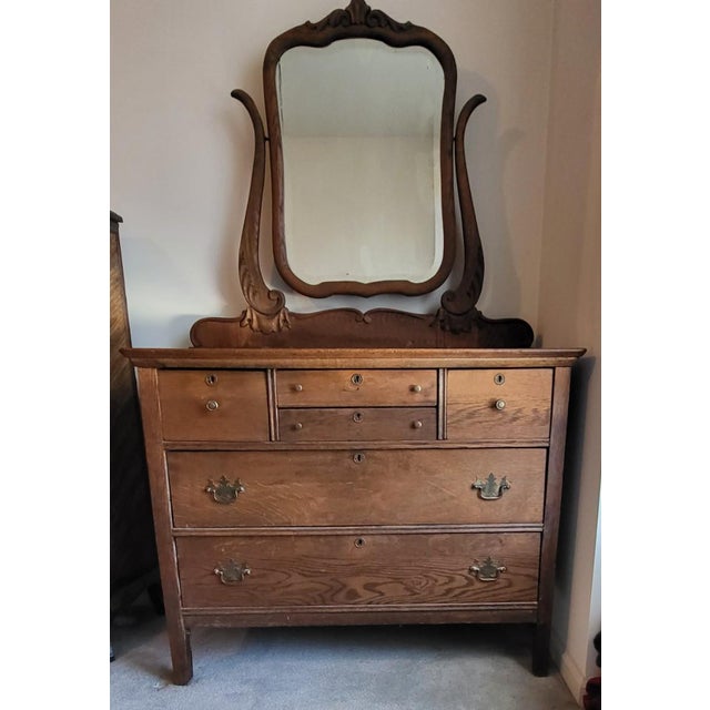 Early American crafted tiger oak dresser from the late 1800’s - early 1900’s era. Beautiful, distinctive wood grain is...