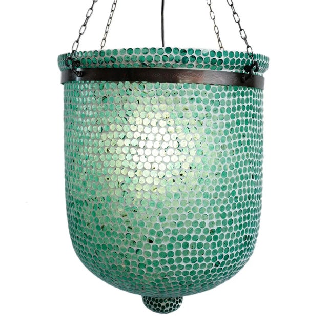 Blue mosaic bucket pendant lantern. Hand crafted in India with beautiful blue mosaic glass. Includes 3' chain and ceiling...