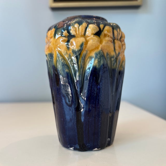 Vintage Brush McCoy vase in excellent condition. Deep indigo blue with orange amaryllis blooms.
