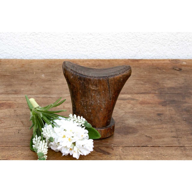 This antique Sidama headrest is more than just a piece of wood; it's a testament to the artistry and traditions of...