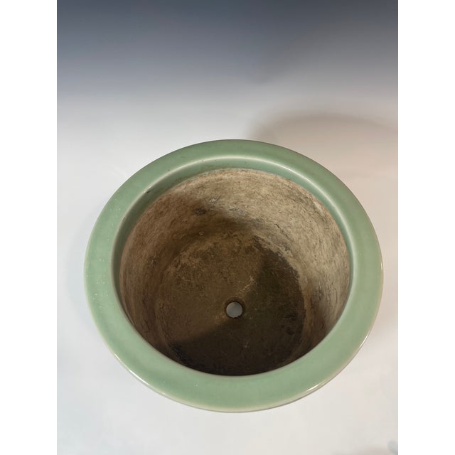 A large antique Japanese Meiji period celadon bonsai pot, Made by Sodoen Ikekatsu .raised with phoenix or butterflies and...