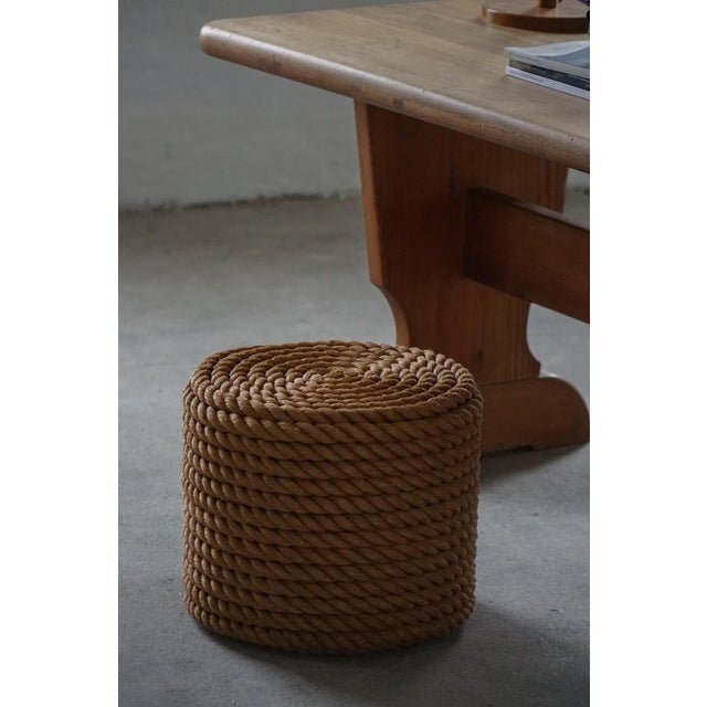This beautiful piece is a French 1980s rope side table and ottoman/stool, a distinctive example of European design that...
