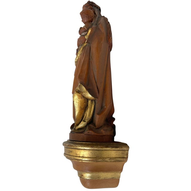 The product is a hand-carved figurine depicting the Virgin Mary and Jesus, crafted by the brand Karl Storr in Munich. Made...