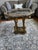 Vintage Hollywood Regency hand-painted, brass gilded occasional/accent table featuring a recessed eglomise glass top with...