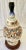 Flower Power! This pretty ceramic table lamp has a ginger jar shaped body sitting on a cherry wood base. Hand painted...