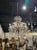 Vintage Italian beaded crystal and amethyst flower 8-light chandelier. Circa 1940. The chandelier has been professionally...