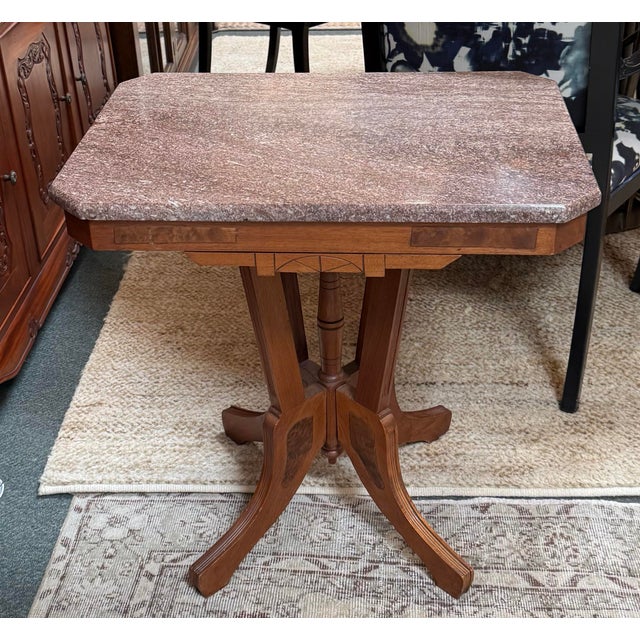 Design Plus Gallery presents a Parlor Table from the Victorian Era. The Eastlake style table has a solid wood pedestal...
