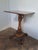 A fine Victorian walnut tilting reading stand, with a richly carved and polychrome-decorated column and elegant carved...