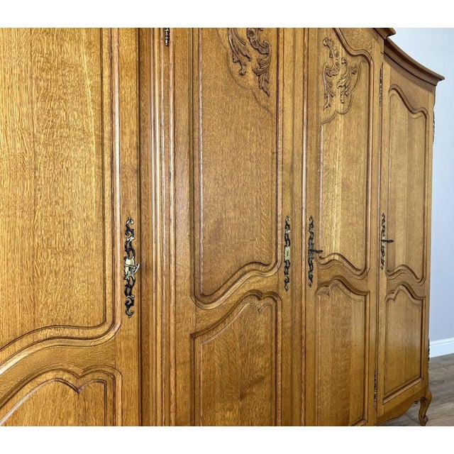 Brown Vintage French Louis XVI Style Carved Oak 4-Door Armoire For Sale - Image 8 of 12