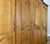 Brown Vintage French Louis XVI Style Carved Oak 4-Door Armoire For Sale - Image 8 of 12