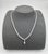 Elevate your style with this modern necklace, designed to impress with its refined elegance. Showcasing approximately...