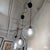 Design Plus Gallery presents a Pair of Contemporary Globe Pendants from Visual Comforts. Each pendant showcases a...
