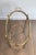This neoclassical style oval bar cart is made of brass with removable trays. This is a French work, circa 1940. Delivery...