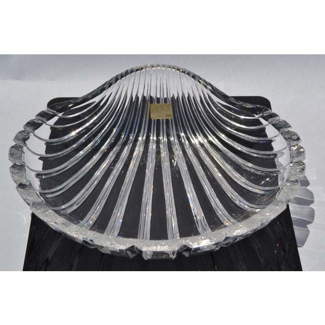 This transparent Mikasa West Germany shell‑shaped, glass platter is a vintage Walther‑Glas–made crystal serving piece from...