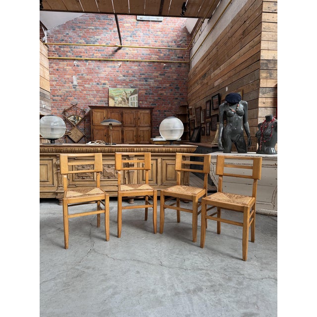 Set of 4 beechwood chairs from the 1960s, designed by French designer Pierre Cruege. Comfortable and sturdy design, with a...