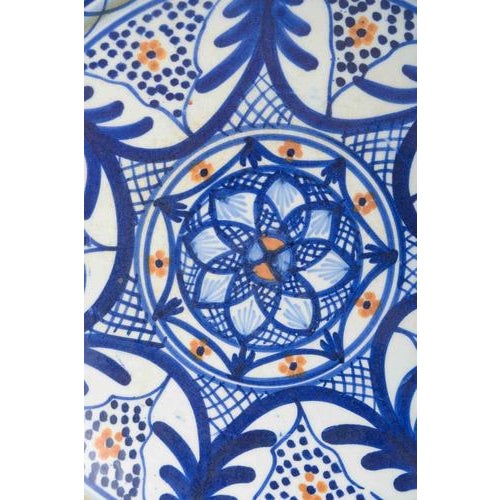 Italian Studio Potter Dish, 1960s. Wheel-thrown faience dish with hand-painted decoration in blue, orange and white tones....