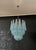 Italian vintage Murano chandelier made by 41 glass petals (light blue crystal, smooth outside, with powder and then rough...