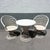 A striking blend of sculptural form and airy design, this mid-century modern spun fiberglass bistro set embodies the era’s...