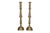 A pair of large candlestick holders made of brass. Traditionally shaped with columns that are turned with tapered...