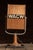 Early broadcast desk microphone featuring a perforated painted wood housing with bold applied “WACW” call-letter badge...