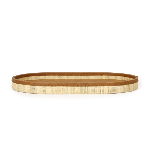 The Hakiri Storage Tray blends natural texture with everyday functionality. Its woven raffia exterior brings warmth and...