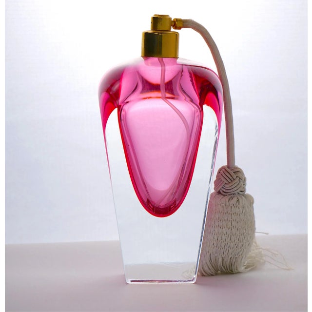 An elegant addition to any vanity table, these beautiful pink color venetian art glass perfume bottle can be filled with...
