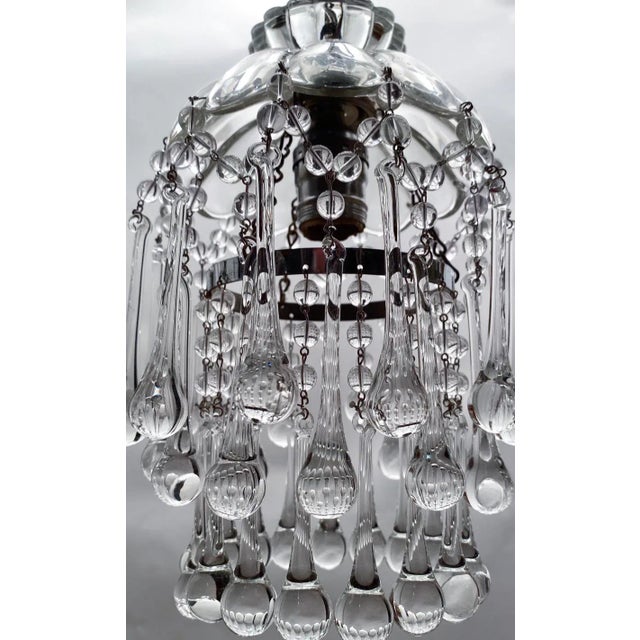 Dome layered chandelier with cut glass dish, octagon chain and 30% leaded crystal teardrops. It rewired and it has 1...