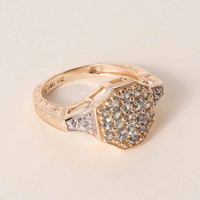 Estate Green Spinel & Diamond Ring 14K Yellow Gold Circa 1990 A charming estate ring showcasing a vibrant cluster of mint...