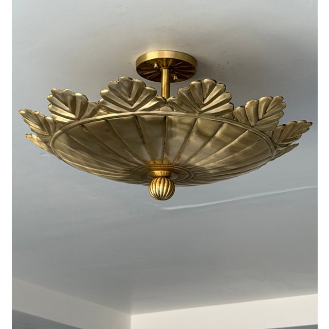 Elevate your home with this handcrafted pure brass flush mount ceiling light, featuring a timeless sculptural design with...