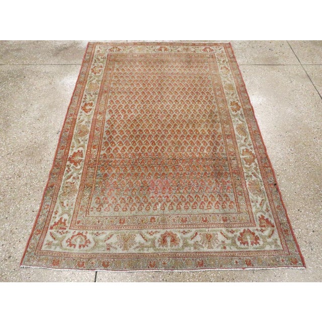 An antique Persian Malayer accent rug handmade during the early 20th century. Measures: 4' 2" x 6' 3"