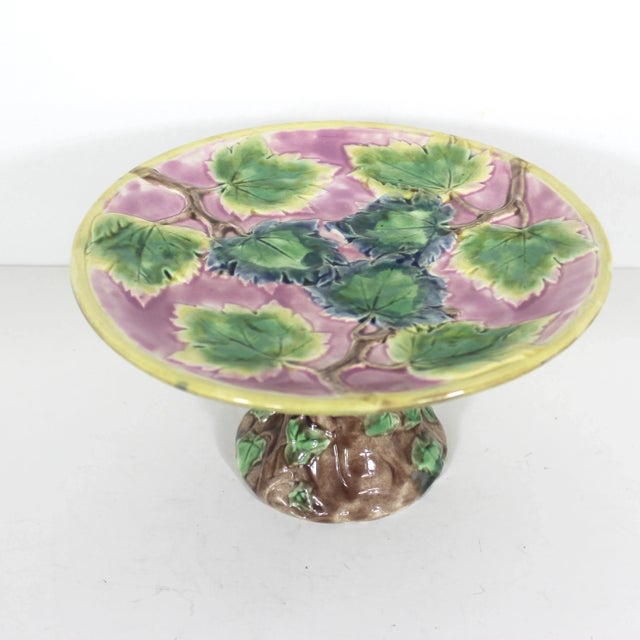 This is a beautiful antique Majolica compote - cake dish rendered in the classic Aesthetic Victorian style. Tree leaf &...