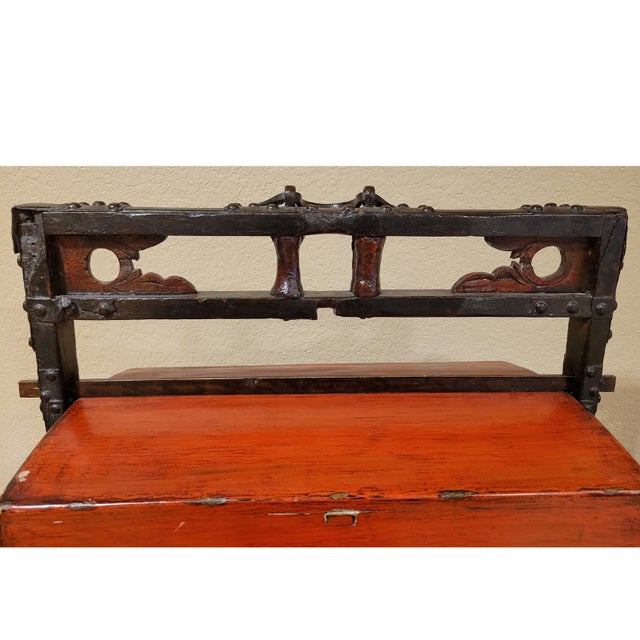 This stunning antique red Chinese wedding basket features three large removable trays, fine carvings, and beautiful iron...