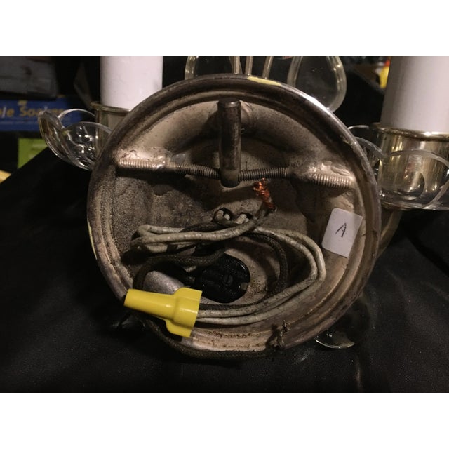 This 50’s vintage sconces are signed B&H for Bradley & Hubbard. These are silver plate The sockets take standard light...