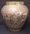 A striking vintage Egyptian Cairo Ware brass vase featuring intricate hand engraving with copper and white metal inlay....