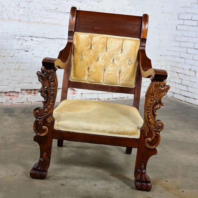 Fabulous Antique Victorian mahogany armchair with hand carved figural lion heads & claw feet. Vintage golden yellow velvet...
