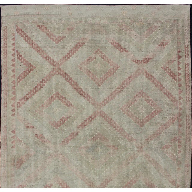 Measures:7'0 x 10'10 Keivan Woven Arts-Large Embroidered vintage rug from Turkey in shades of tan, light green, light red,...