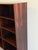 Beautiful vintage Danish Mid Century Modern bookcase crafted in richly grained rosewood. The dramatic rosewood showcases...