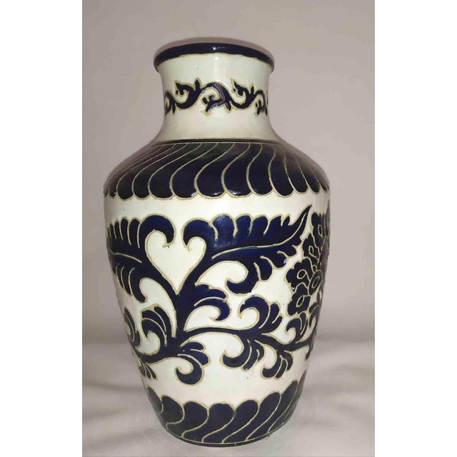 Beautiful vase realized in Capodimonte (Napoli) in the 1960s. Hand made and painted. Very minor chip on top of the neck.