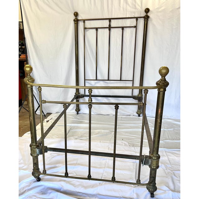 A rare and exceptional matching pair of genuine antique Victorian/Edwardian brass twin bed frames, dating from the late...