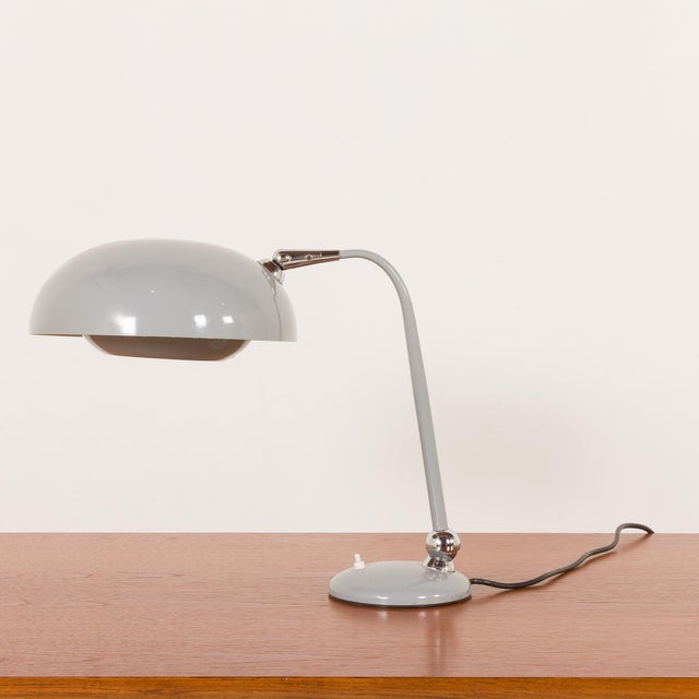 This italian mid-century desk lamp from the 1960s, is recognized in italy as stilnovo design. It is a refined example of...