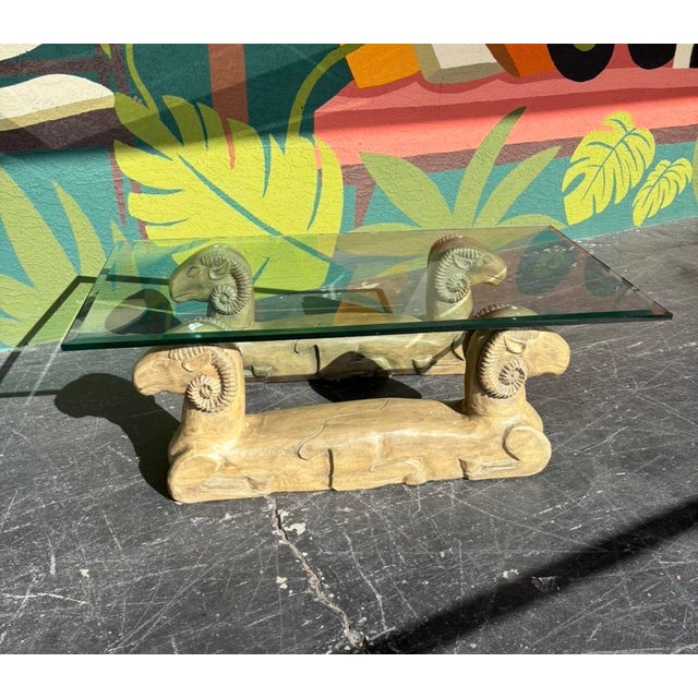 Great statement piece to anchor your space. Base comprised of sturdy plaster and a beveled glass top. This can go with...