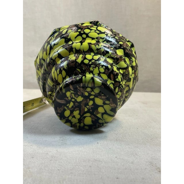 Eye-catching vintage Murano-style hand blown art glass vase featuring a vibrant yellow base with dramatic black spatter...
