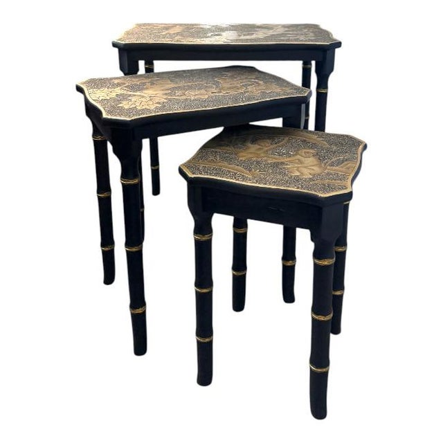 Add timeless elegance to your home with this beautifully restored set of three vintage Chinoiserie nesting tables....