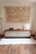 A very low teak sideboard from the 1960s, 164 cm long and only 52 cm high. Two wide sliding doors are framed in wood and...