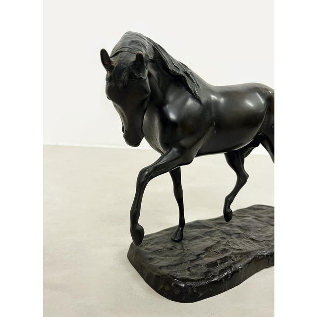 Bronze sculpture made using the lost-wax casting technique, second half of the 20th century. The figure is enhanced by a...