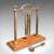 This is an antique veranda supper bell. An English, brass and oak afternoon tea gong, dating to the Edwardian period,...