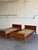 Crafted in Denmark, this set of twin beds showcases clean Scandinavian lines and rich teak wood grain. The warm organic...