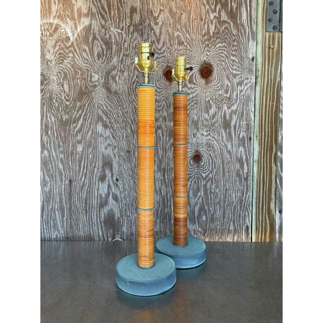 Enhance your living space with these unique vintage coastal-inspired wrapped pencil reed column lamps. Masterfully...