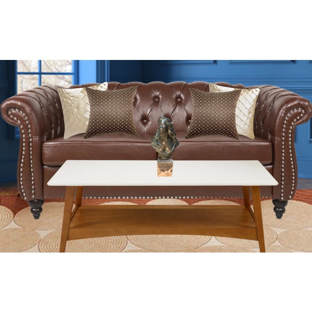 Radiating quiet elegance and introspective poise, Camille is a finely sculpted bust of a woman created by Alice Heath for...