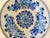 A superb 18th-Century Dutch Delftware plate by the factory Porceleyne Bijl. It is hand painted with a floral design with a...